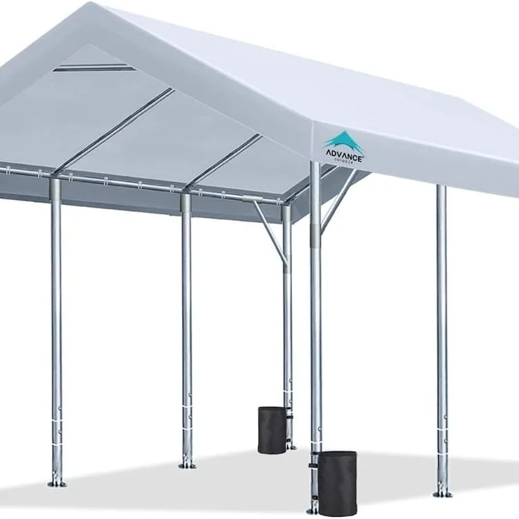Carport canopy with a peaked roof and sturdy metal frame in a clear setting